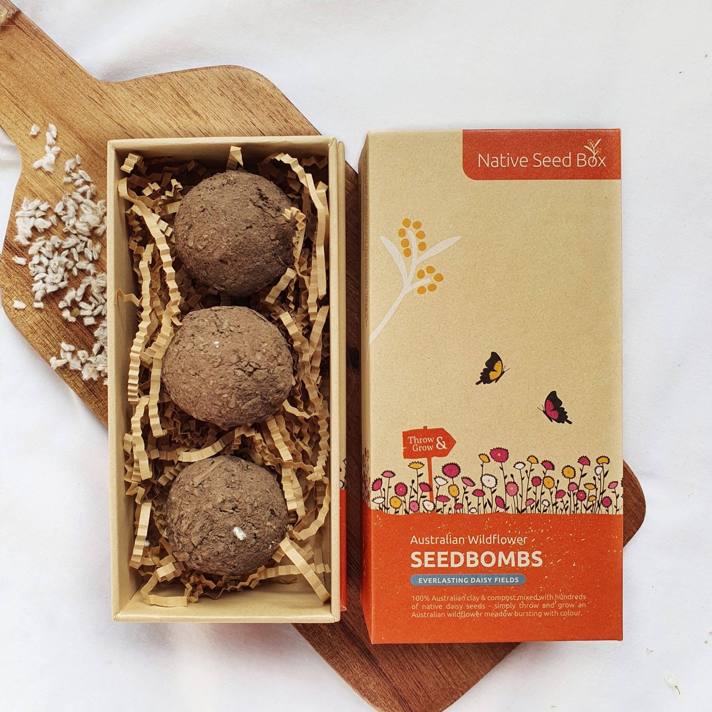 Roll of clay and compost with Everlasting Daisy seeds