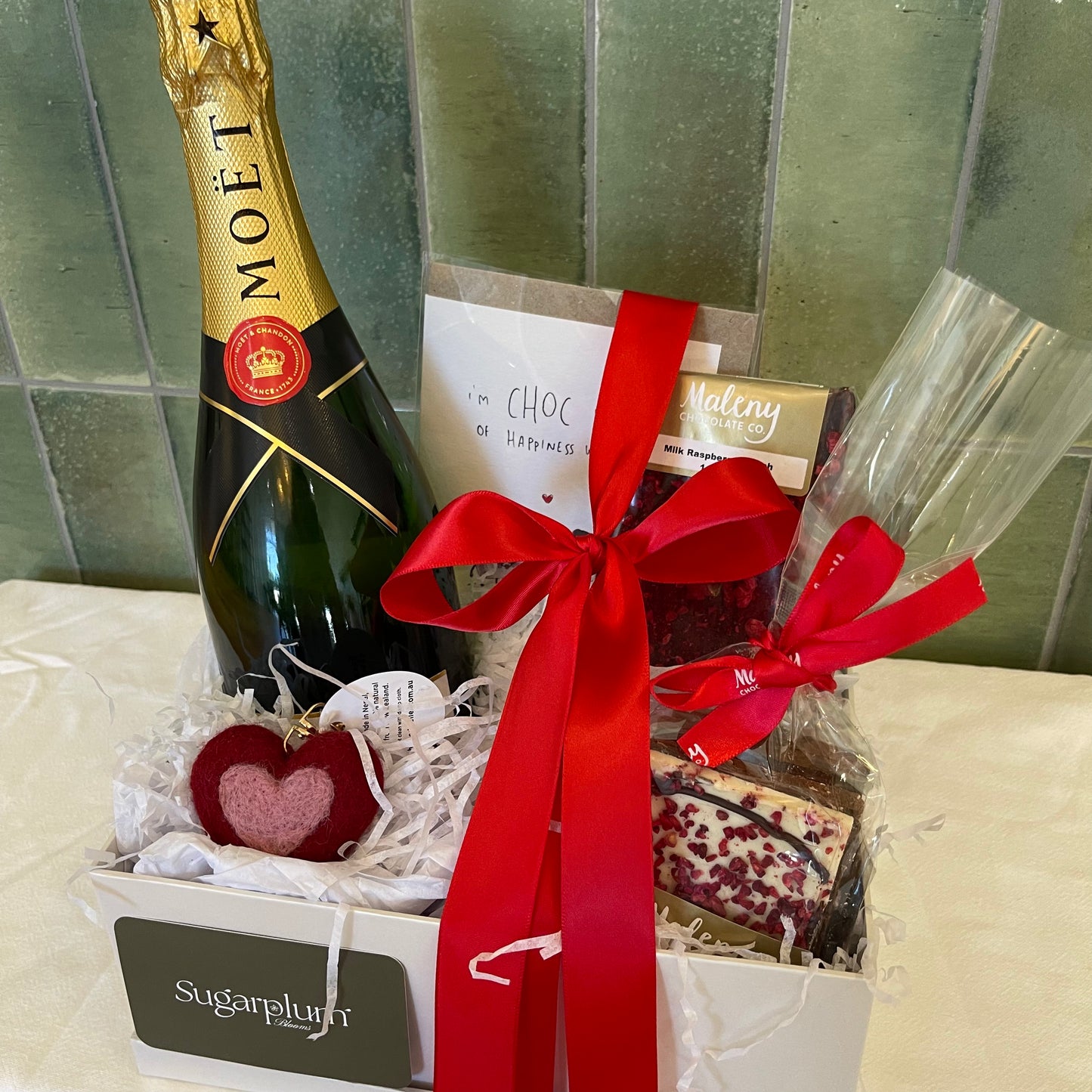 Celebration gift hamper with Moët bubbly and chocolate treats