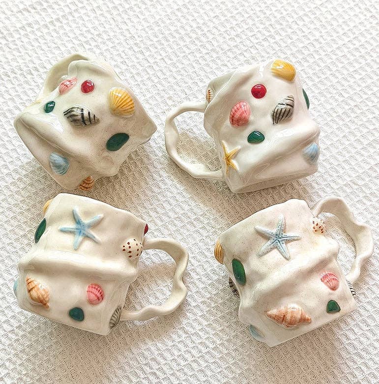 Ocean-themed mug with soft, dreamy coastal colours